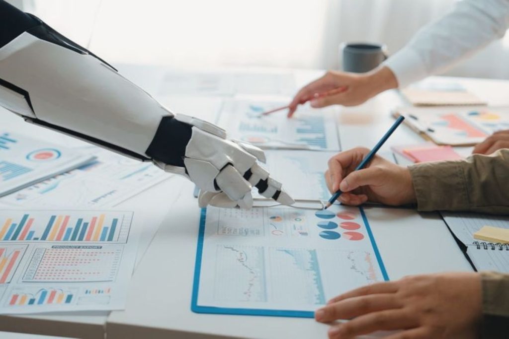 IA pointant sur un graphique. dans une réunion de compliance. stocklib 246937203_m