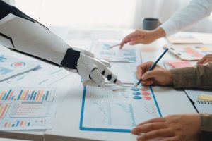 IA pointant sur un graphique. dans une réunion de compliance. stocklib 246937203_m